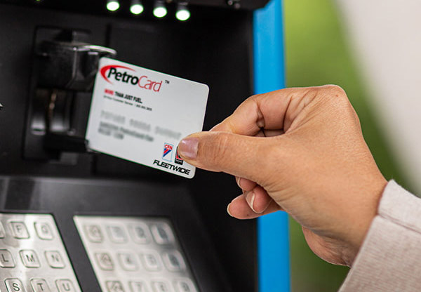 Truck repair shop. Vehicle serviceman with controlling trucks that need maintenance and service. Petro Fleet Fuel Card in Seattle WA